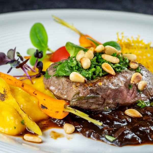 Gebratener Oktopus – Chorizo | Kartoffel | Tomate | Maracuja-Öl